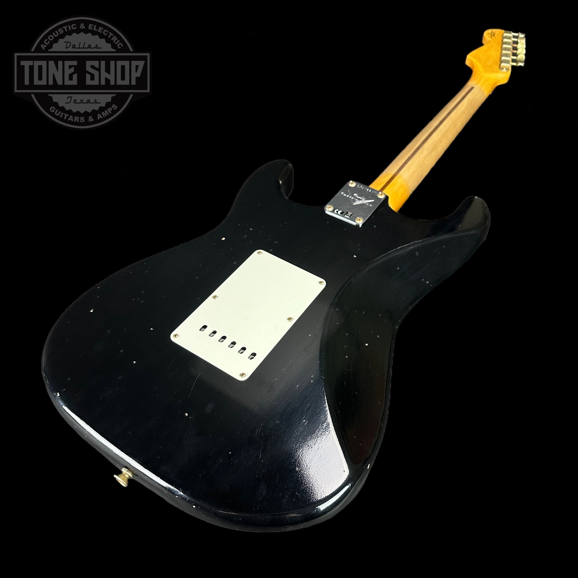 Back angle of Fender 1956 Stratocaster Journeyman Relic Maple Neck Aged Black.