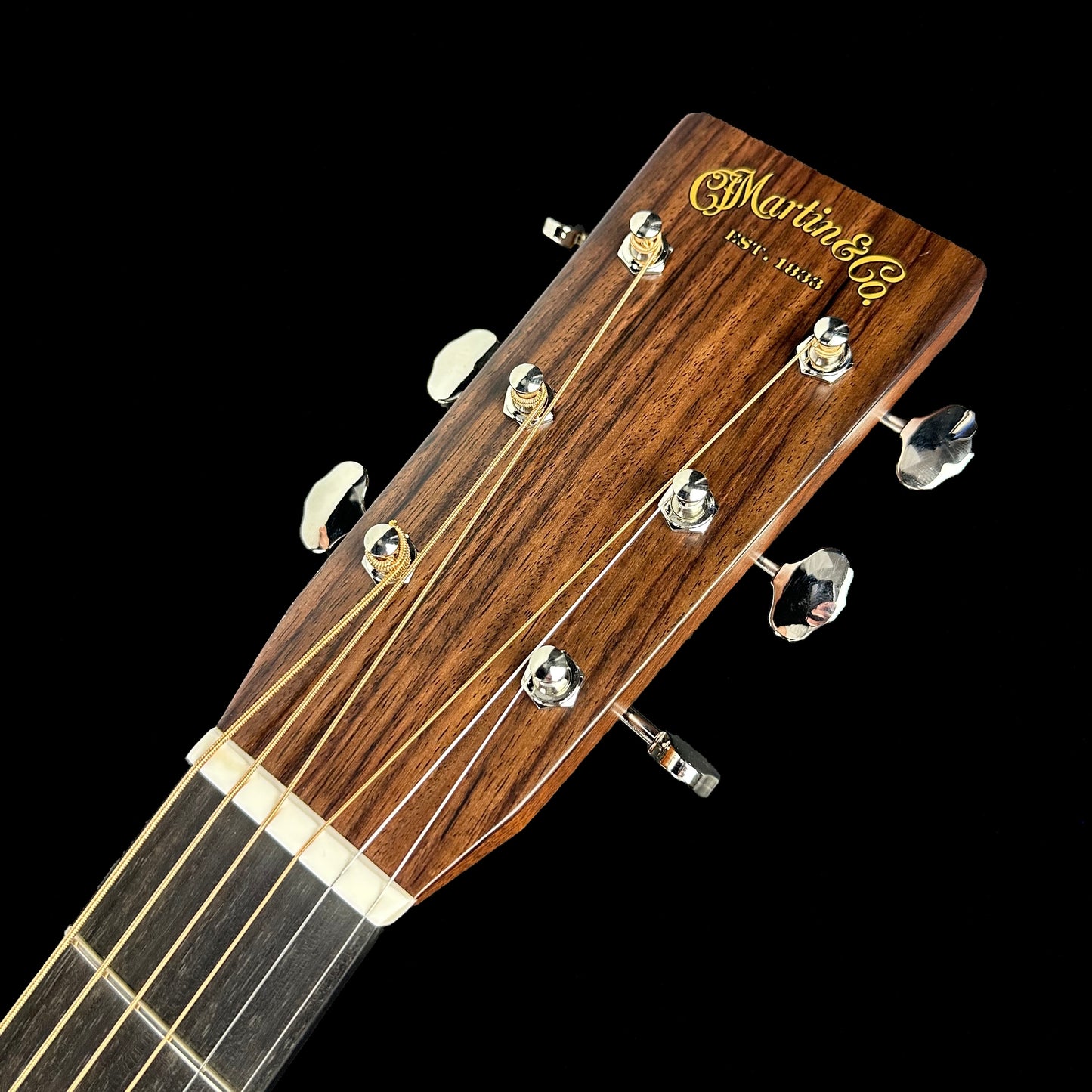 Closeup of Martin Custom Shop 28 Style 0000 Adirondack/WEIR headstock.