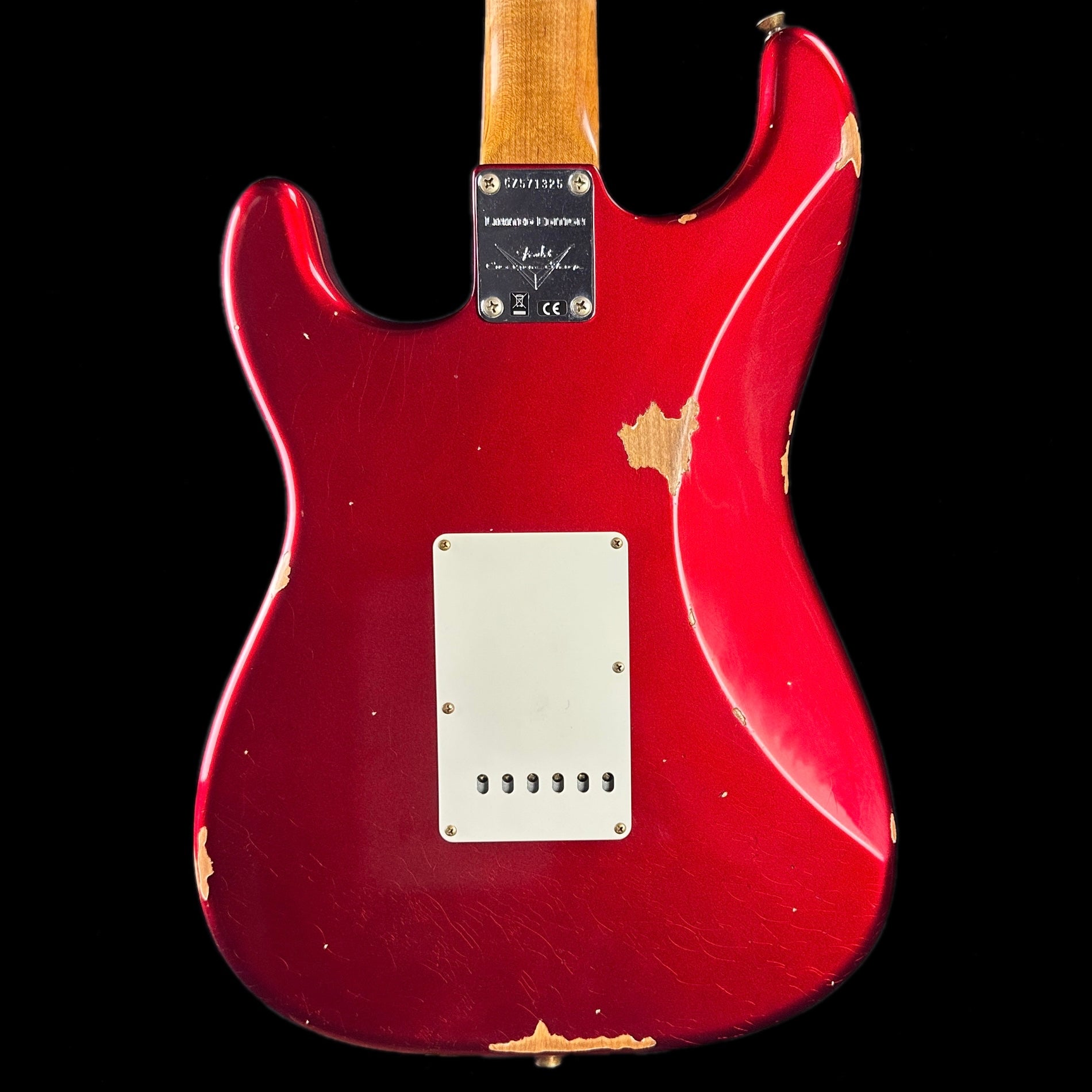 Back of body of Fender Custom Shop Limited Edition '63 Strat Relic Aged Candy Apple Red.