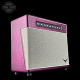 Pink and gray Magnatone amplifier on a black background