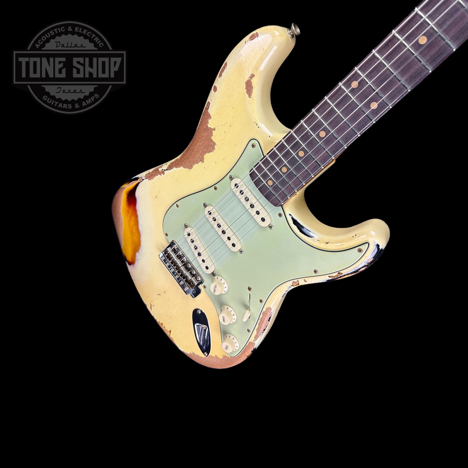 Front angle of Fender Custom Shop 1961 Stratocaster Heavy Relic Aged Vintage White/3-color Sunburst.