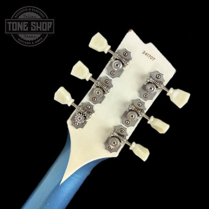 Back of headstock of Rock N Roll Relics Revenge Lake Placid Blue Med Aging.