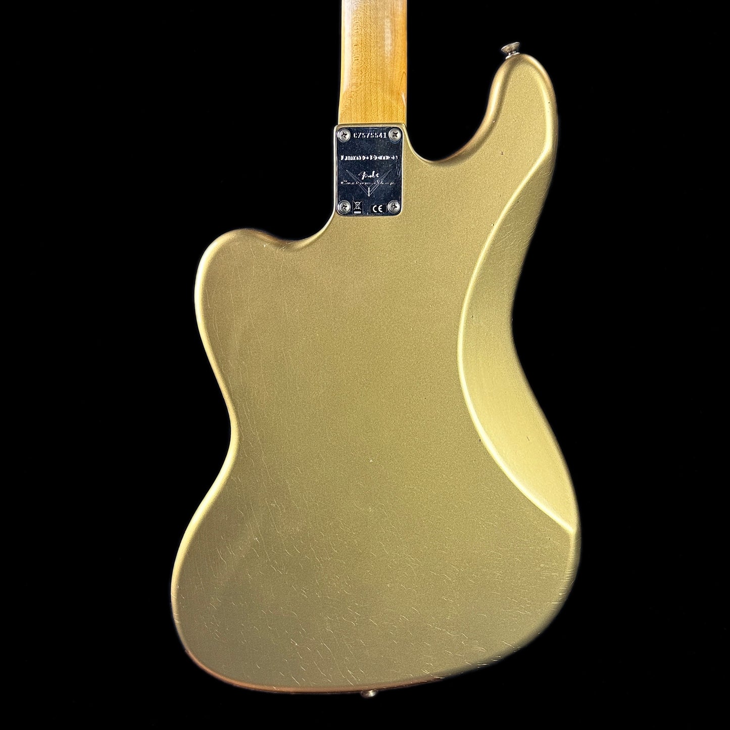 Back of body of Fender Custom Shop Limited Edition Bass VI Journeyman Relic Aged Aztec Gold.