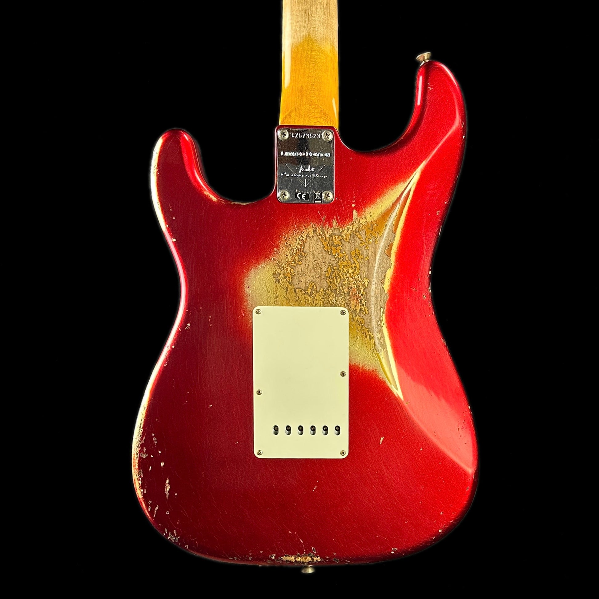 Back of body of Fender Custom Shop Limited Edition '62 Strat Heavy Relic Aged Candy Apple Red Over 3 Color Sunburst.