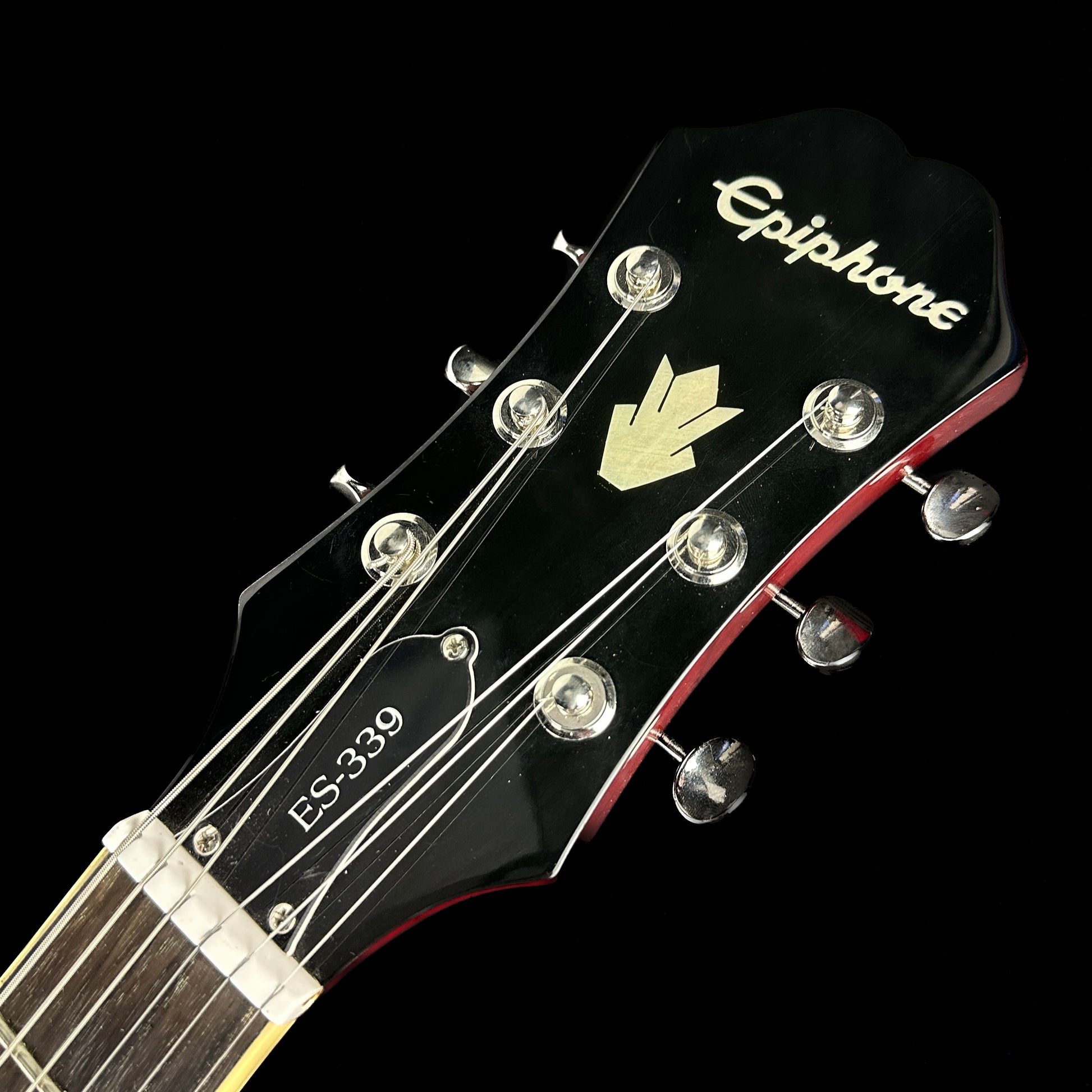 Front of headstock of Used Epiphone ES-339 Dot Cherry.
