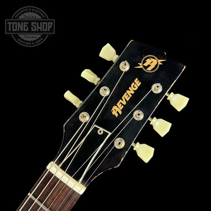 Front of headstock of Rock N Roll Relics Revenge Lake Placid Blue Med Aging.