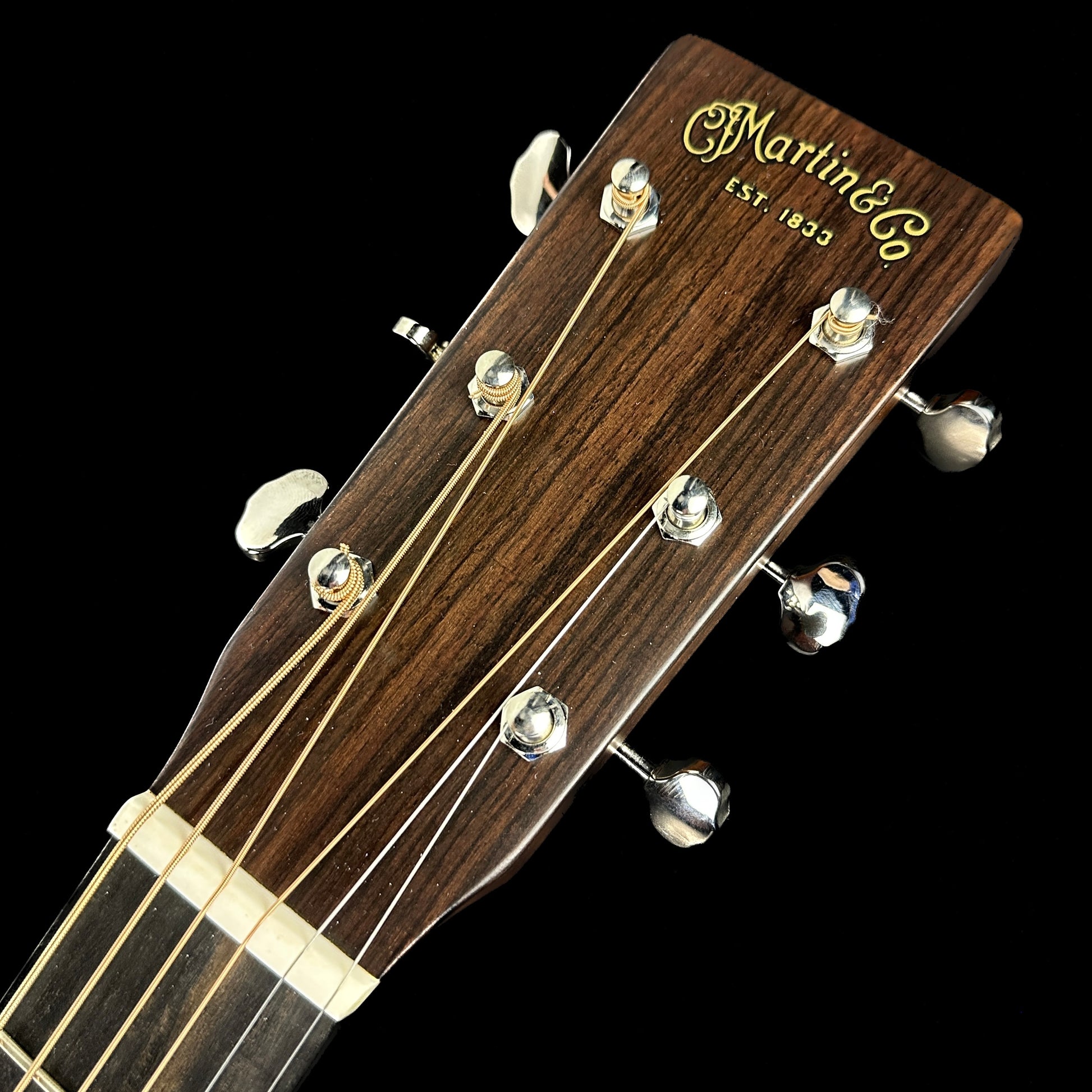 Front of headstock of Used Martin D-18 Ambertone.
