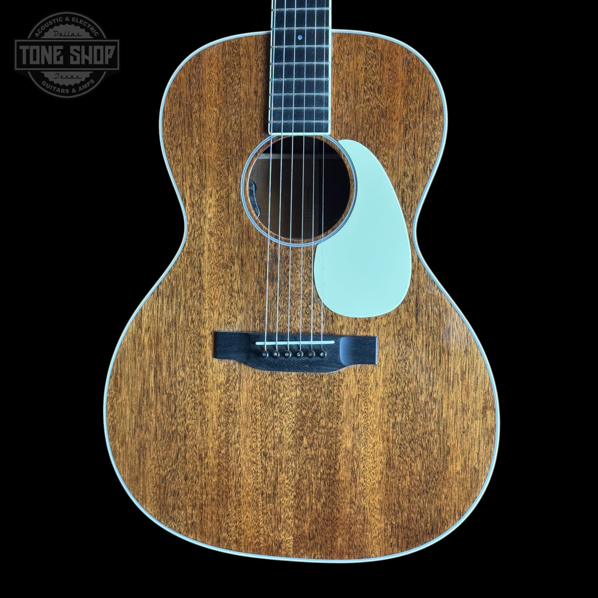 Martin Custom Shop 00L-14 All-Mahogany guitar with a light wood finish on a black background, featuring the Tone Shop logo.