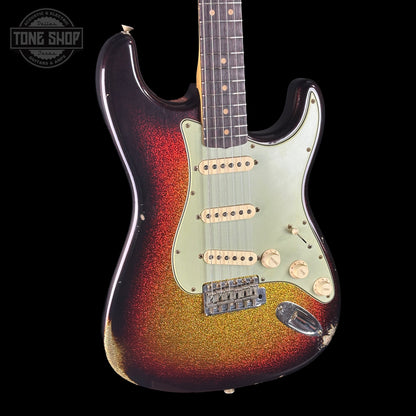 Fender Stratocaster guitar with a sunburst finish on a black background, featuring the Tone Shop logo.