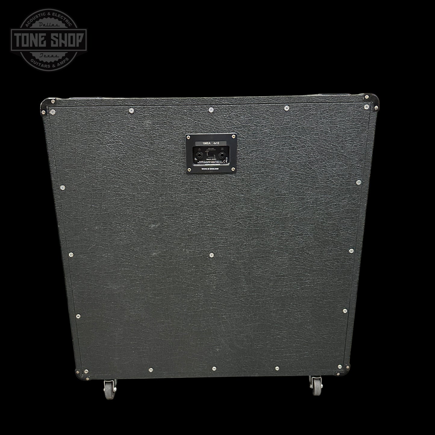Guitar amplifier cabinet with brand logo in the corner