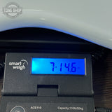 Fender Custom Shop Yngwie Malmsteen Strat Sonic Blue on scale displaying weight.