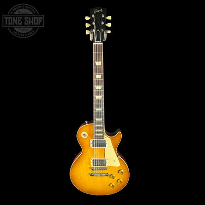 Gibson Les Paul electric guitar with a sunburst finish on a black background, featuring the Tone Shop logo.