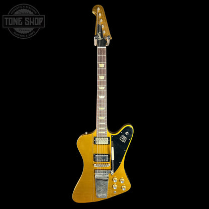 Gold electric guitar on a black background with 'Tone Shop' logo.