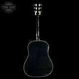 Acoustic guitar on a black background with 'Tone Shop' logo.