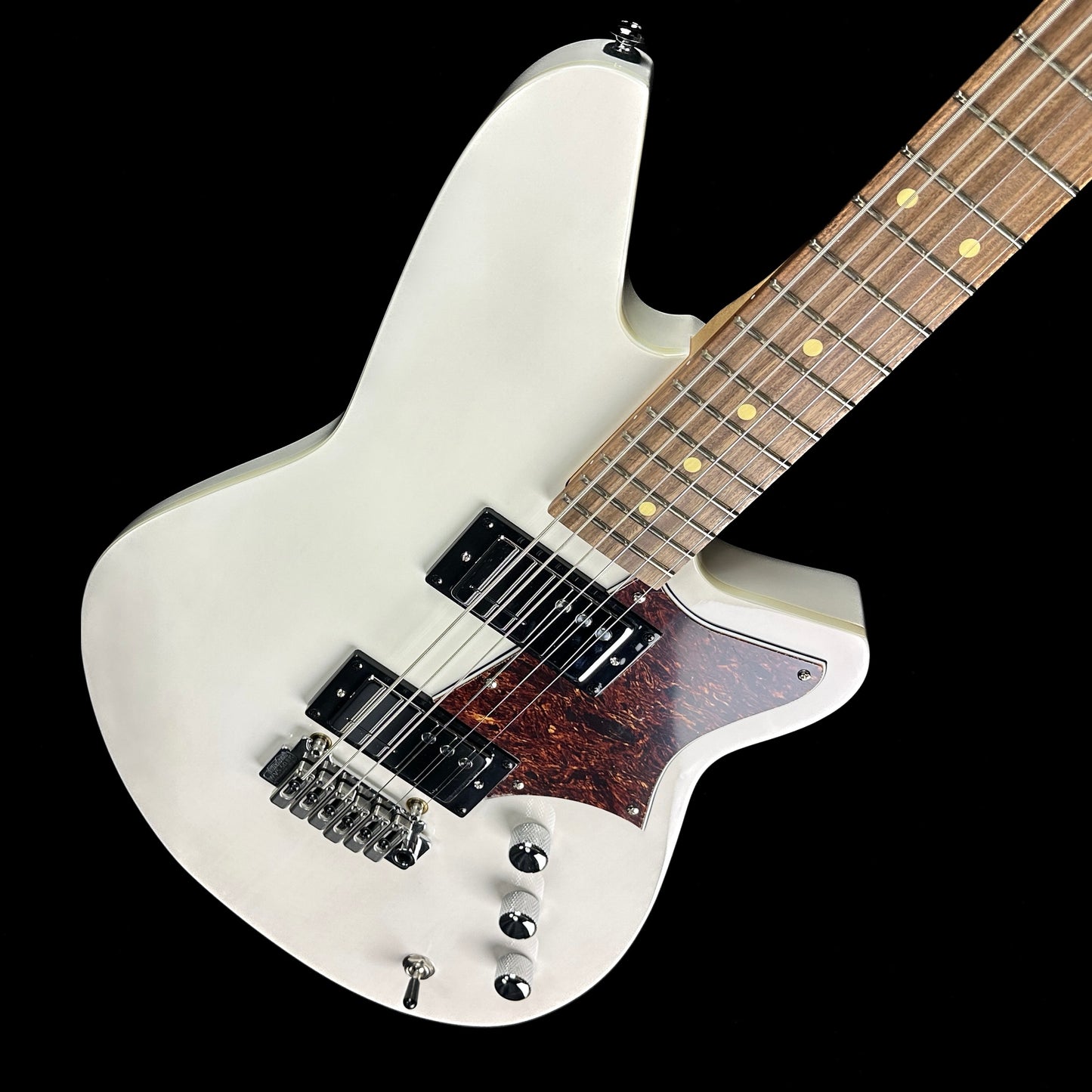 Front angle of Used Reverend Descent Baritone Trans White.