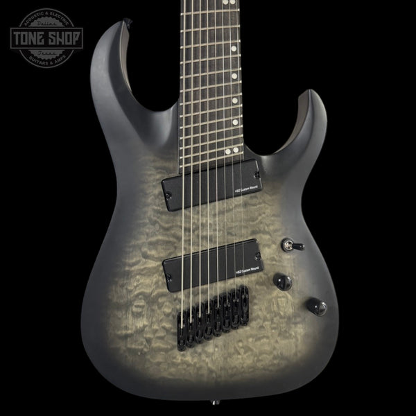 Electric guitar with a textured body on a black background, featuring the Tone Shop logo.
