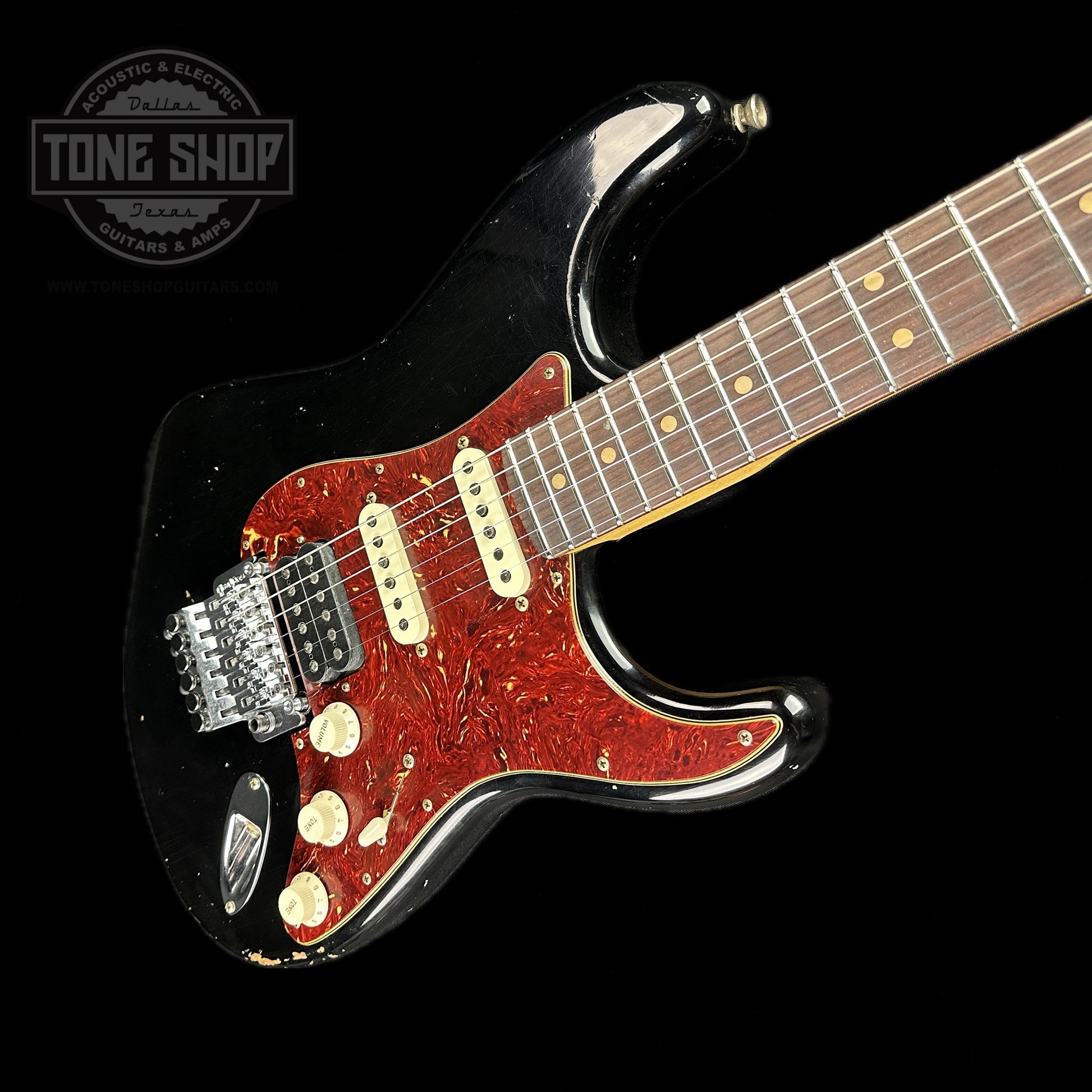 Front angle of Fender Custom Shop '69 Stratocaster Relic HSS Black Reverse Headstock.