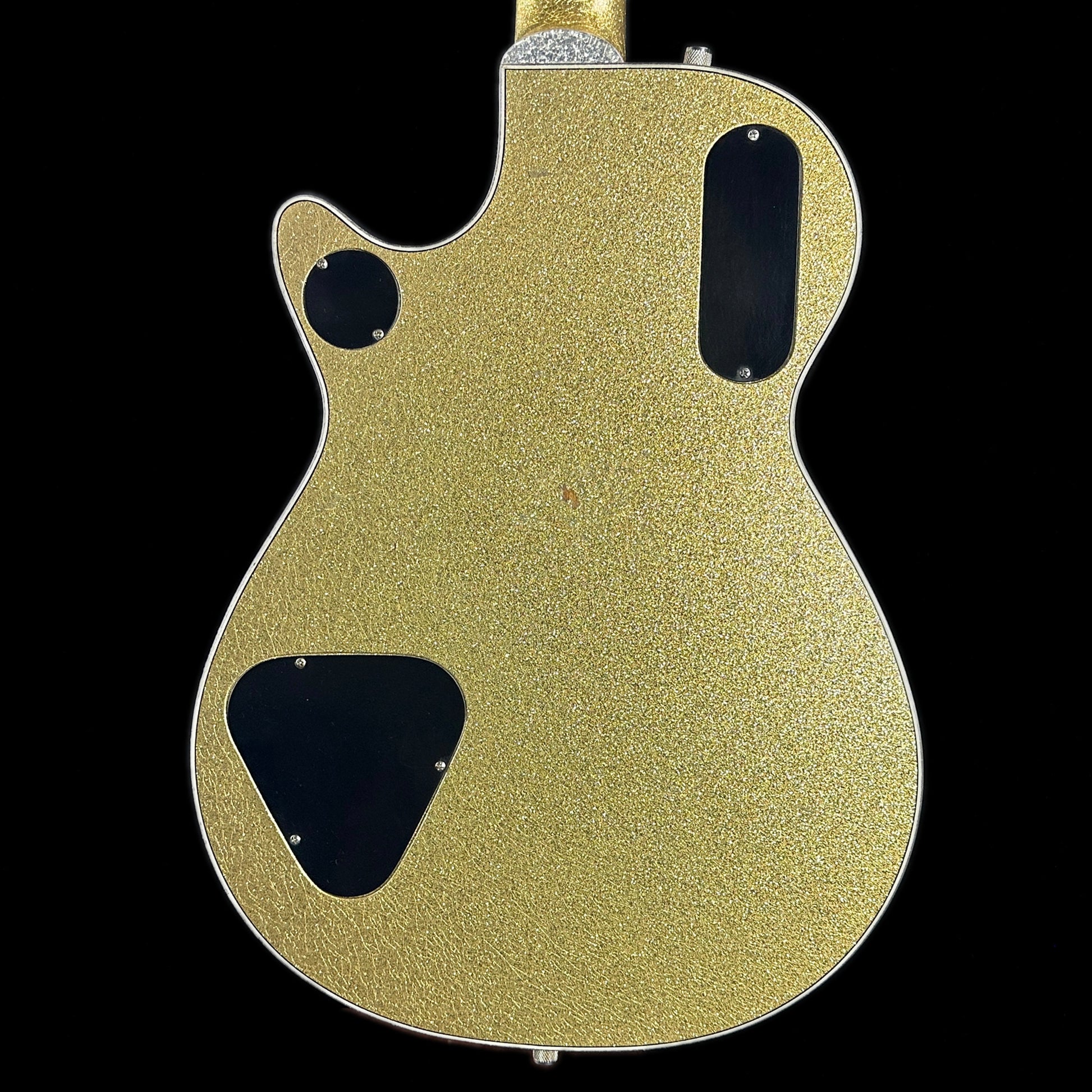 Back of body of Gretsch Custom Shop G6134CS-59 Penguin Gold Sparkle.