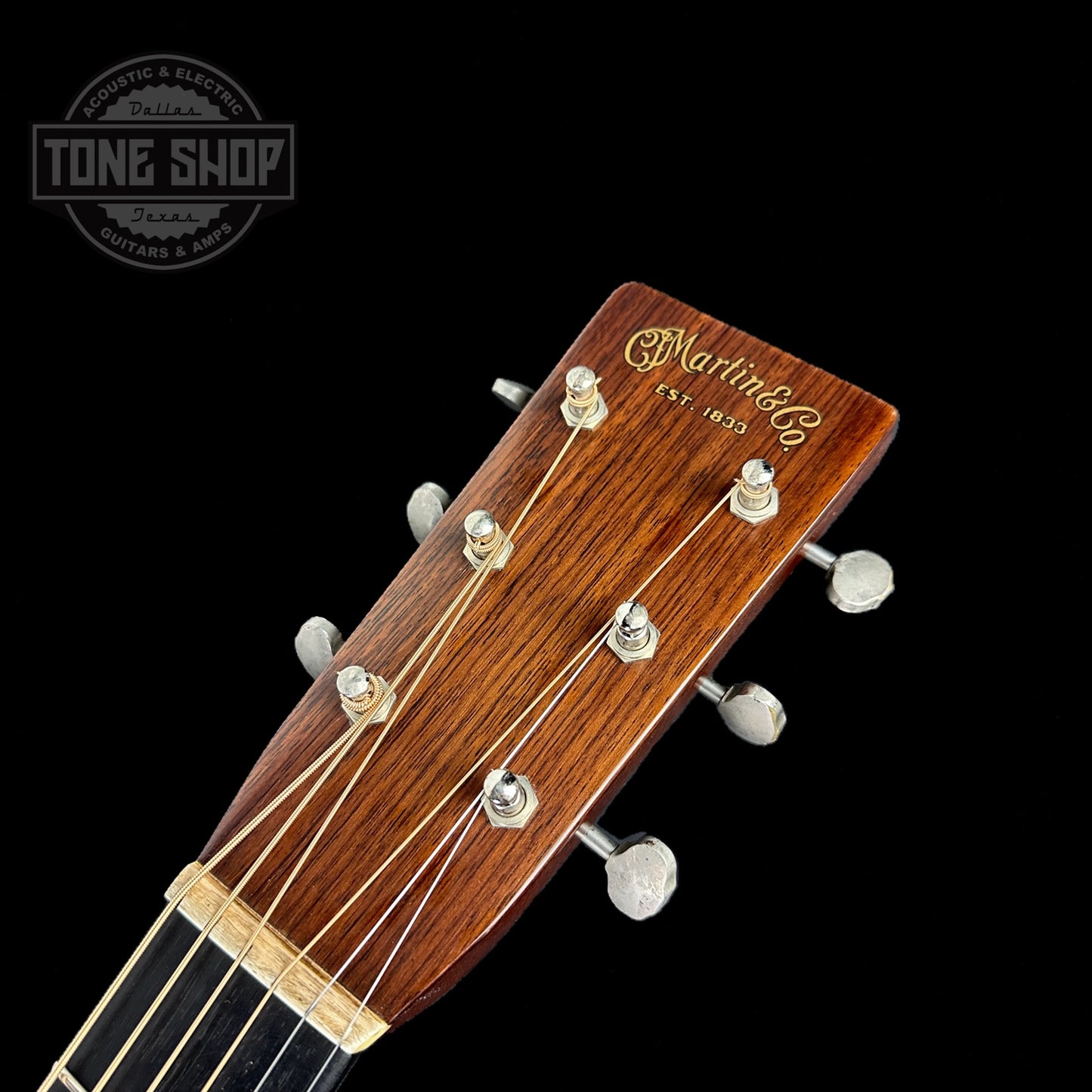 Front of headstock of Martin Custom Shop D-28 Authentic 1937 Vintage Low Gloss w/Stage 1 Aging.