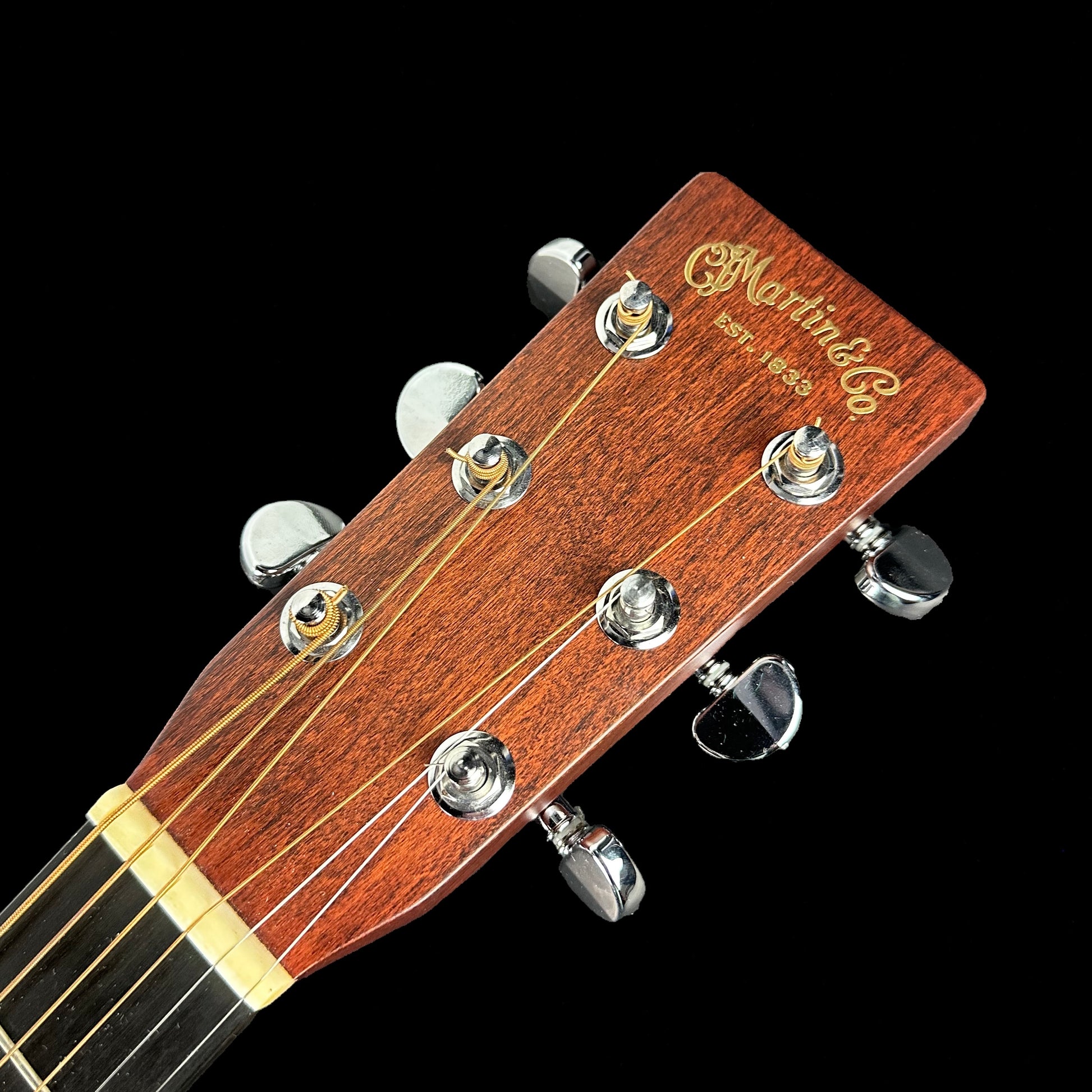 Headstock of Used 2010 Martin D Cherry.