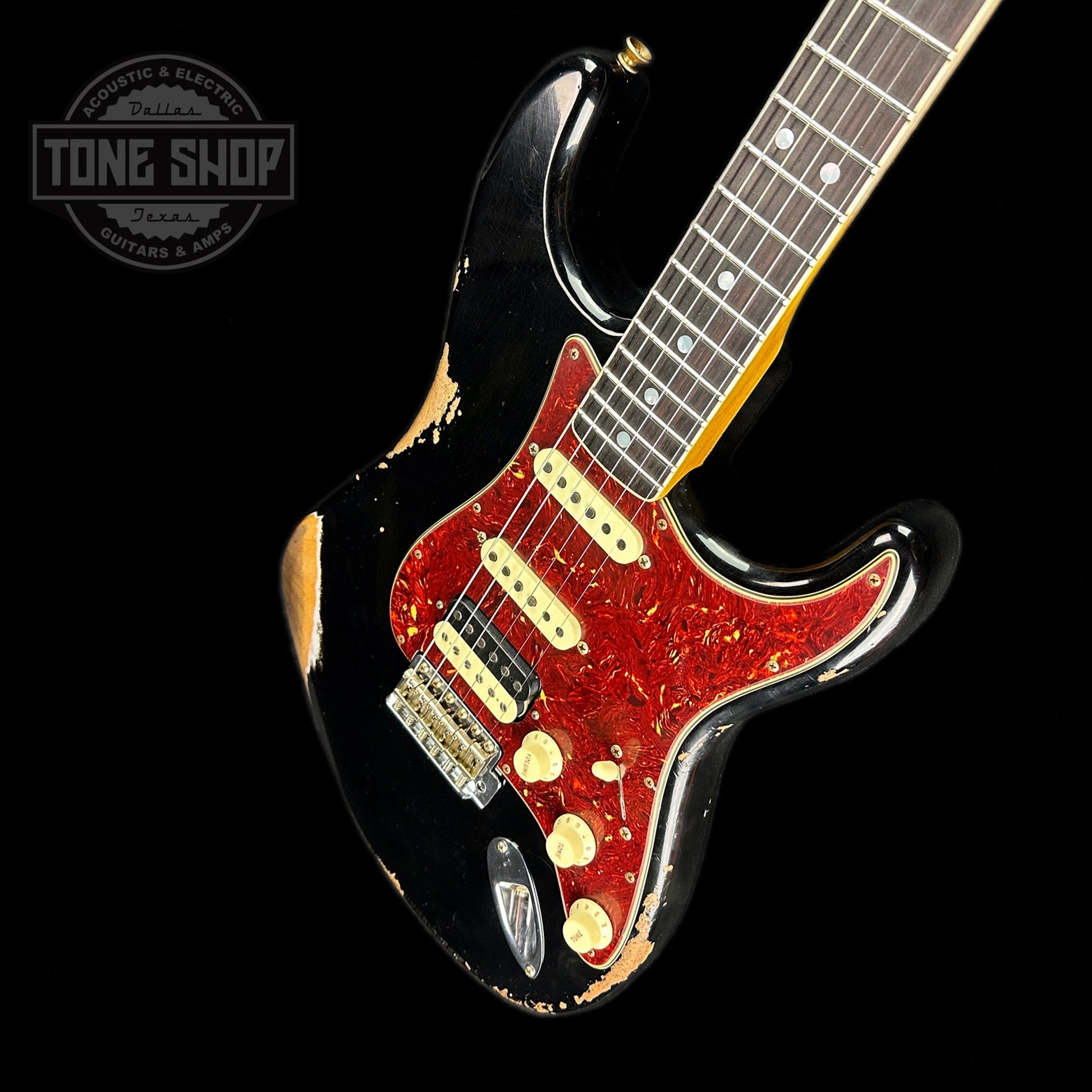 Front angle of Fender Custom Shop Limited Edition '67 Hss Strat Heavy Relic Aged Black.