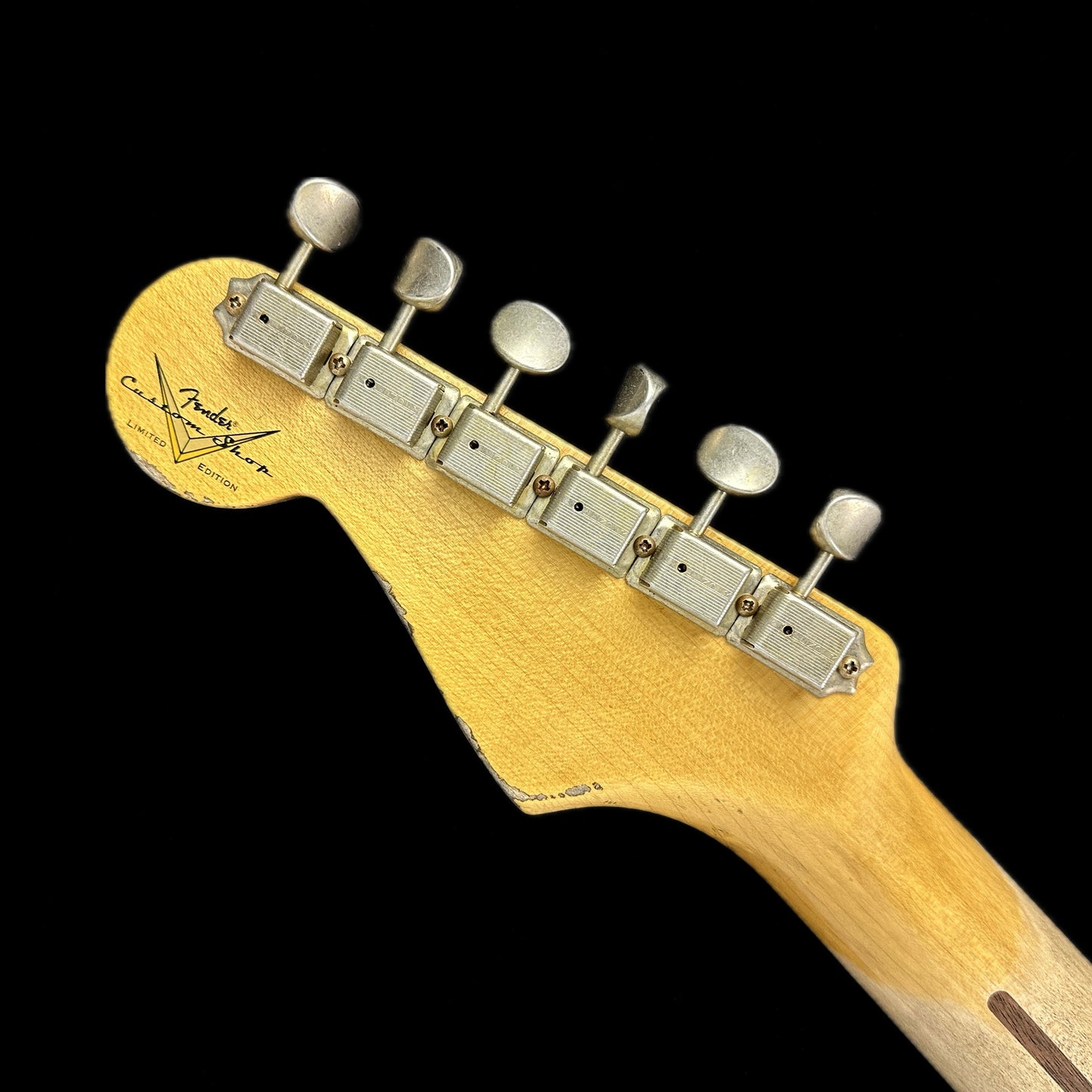 Back of headstock of Fender Custom Shop LTD 70th Anniversary 1954 Stratocaster Heavy Relic 2-Color Sunburst.