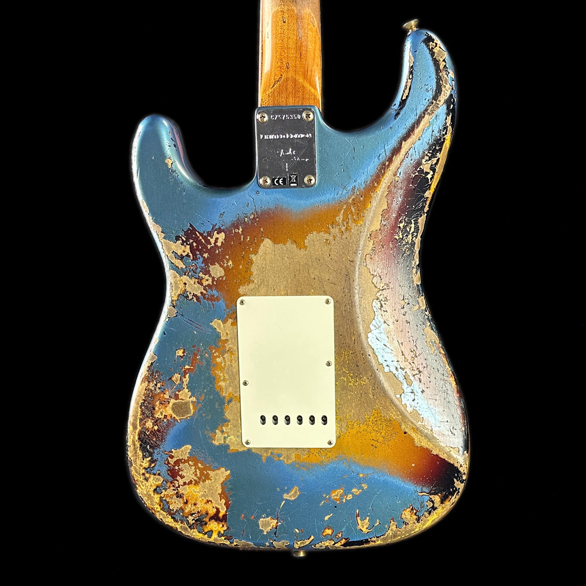 Back of body of Fender Custom Shop Limited Edition Roasted '60 Strat Super Heavy Relic Aged Lake Placid Blue Over 3 Color Sunburst.