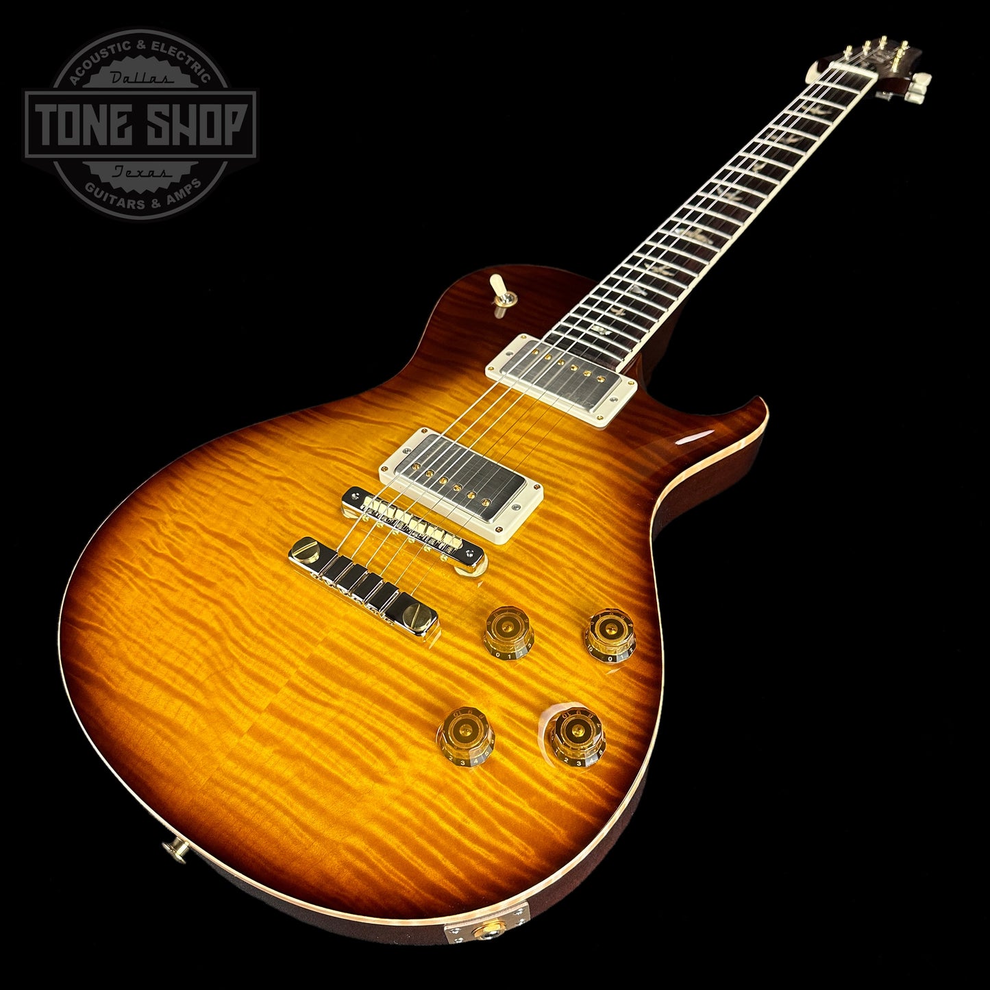 Front angle of PRS Paul Reed Smith McCarty 594 Singlecut 10 Top Tobacco Sunburst Hybrid Package.