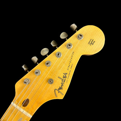 Front of headstock of Fender Custom Shop LTD 70th Anniversary 1954 Stratocaster Journeyman Relic 2-Color Sunburst.