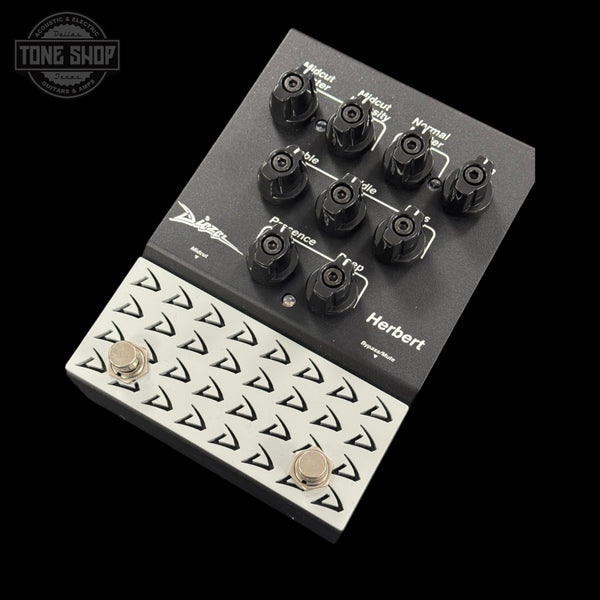 Guitar effects pedal with control knobs and labeled sections on a black background, featuring the 'Tone Shop' logo.