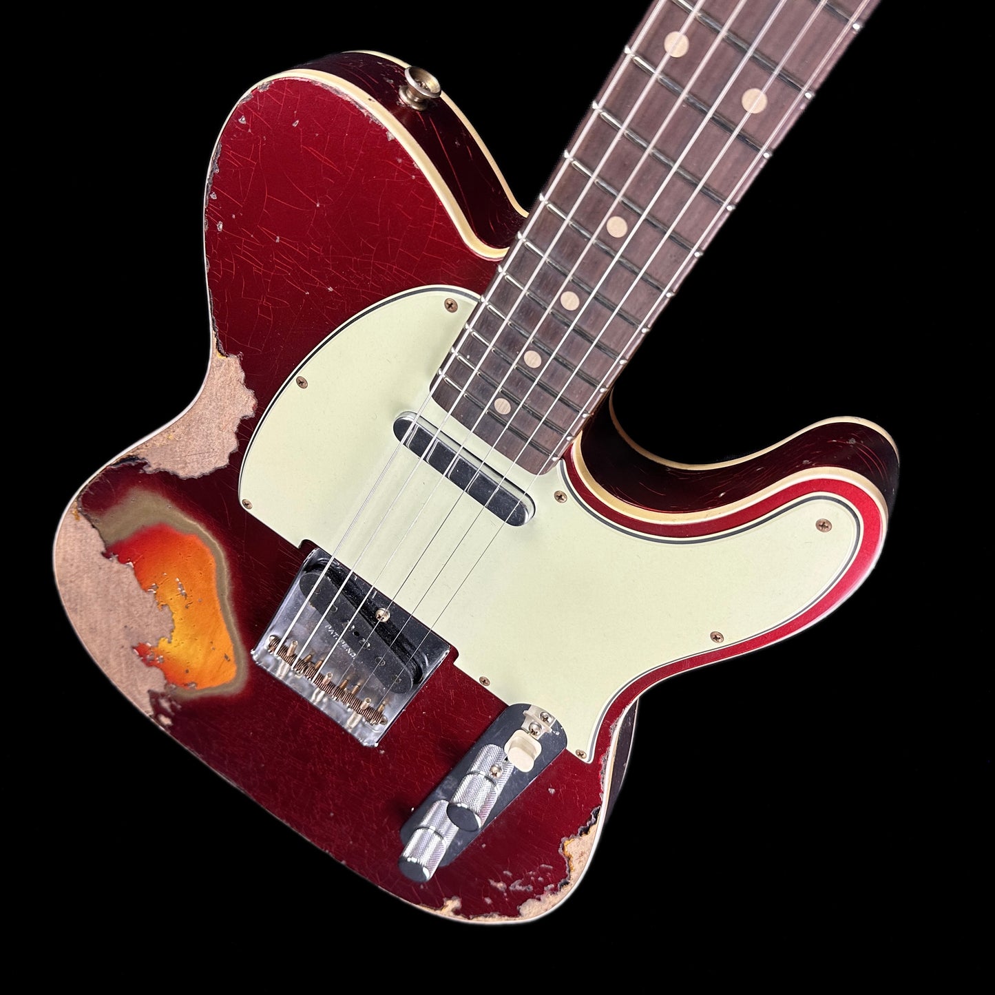 Front angle of Fender Custom Shop Limited Edition '60 Tele Custom Heavy Relic Aged Candy Apple Red/ 3-color Sunburst.