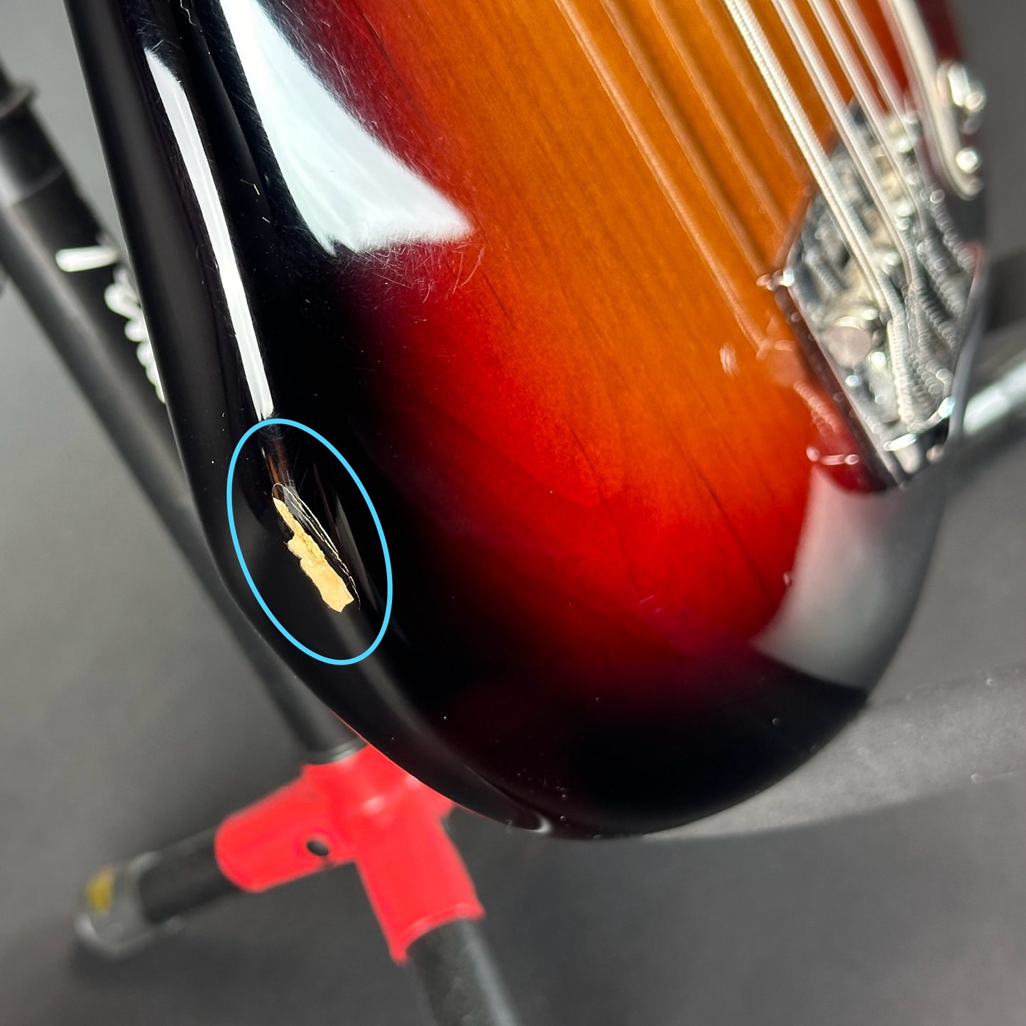 Ding on side of Used 2021 Fender American Pro II Precision Bass Sunburst.