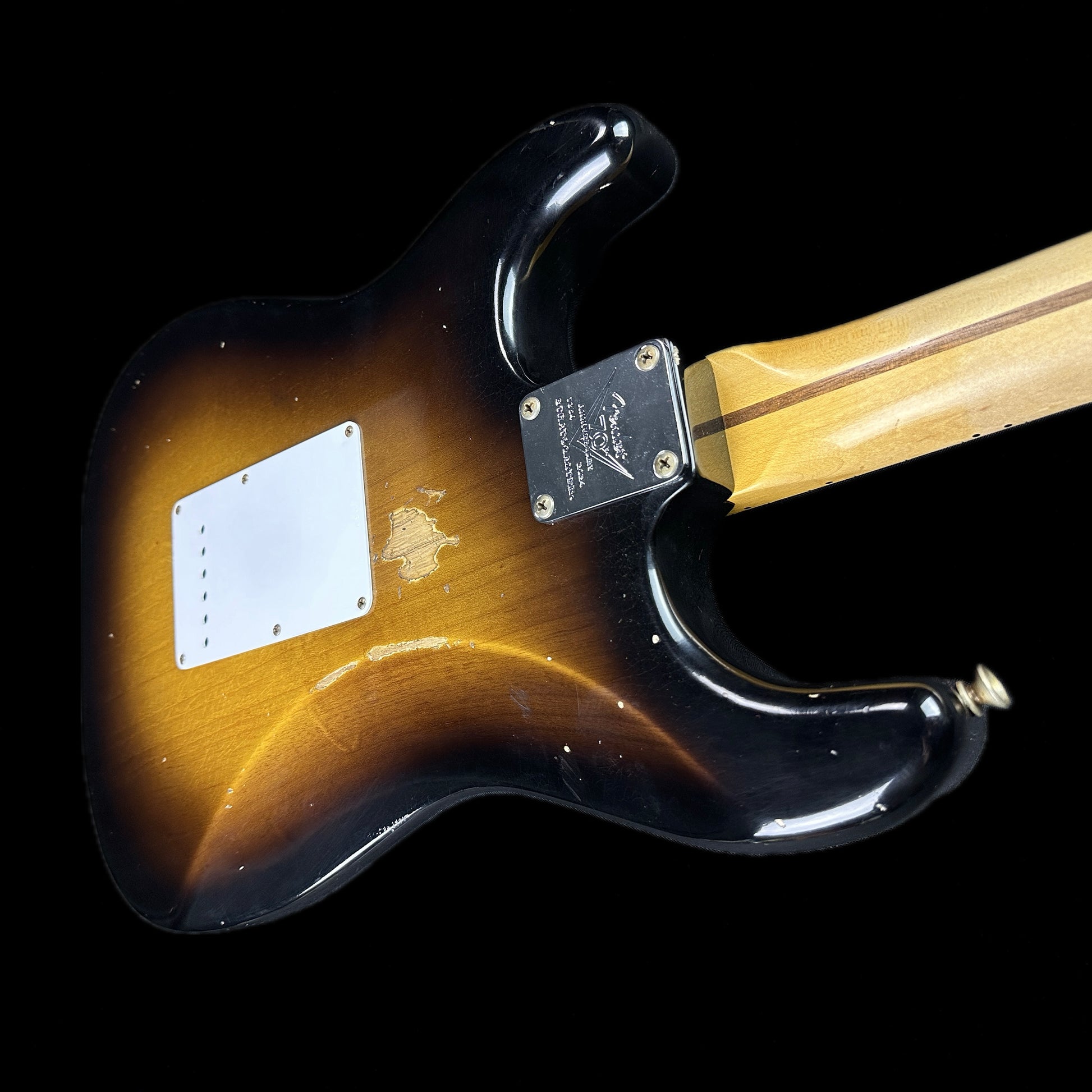 Back angle of Fender Custom Shop LTD 70th Anniversary 1954 Stratocaster Relic 2-Color Sunburst.