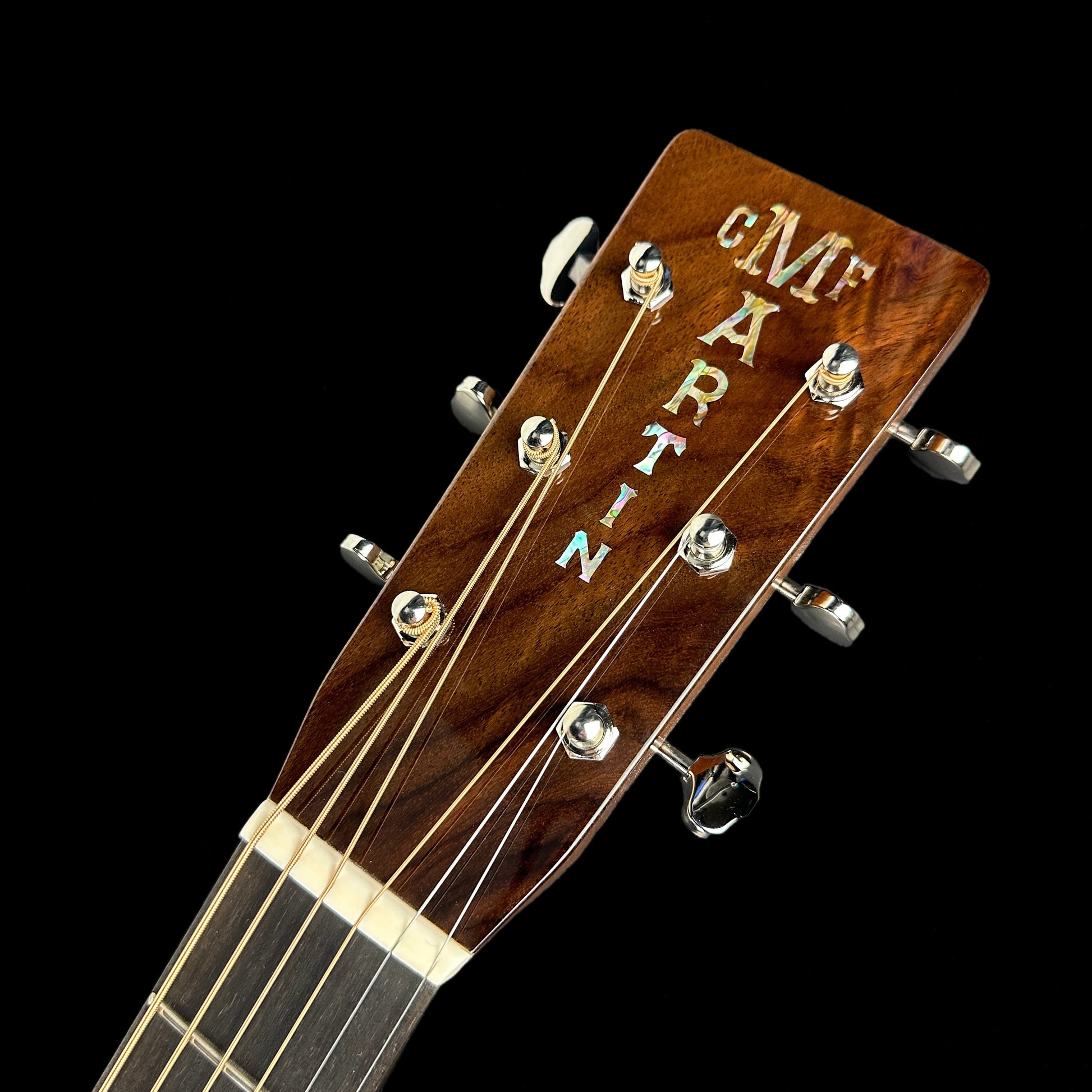 Front of headstock of Martin Custom Shop Sloped Shoulder 28 Style Dread Adirondack/WEIR.