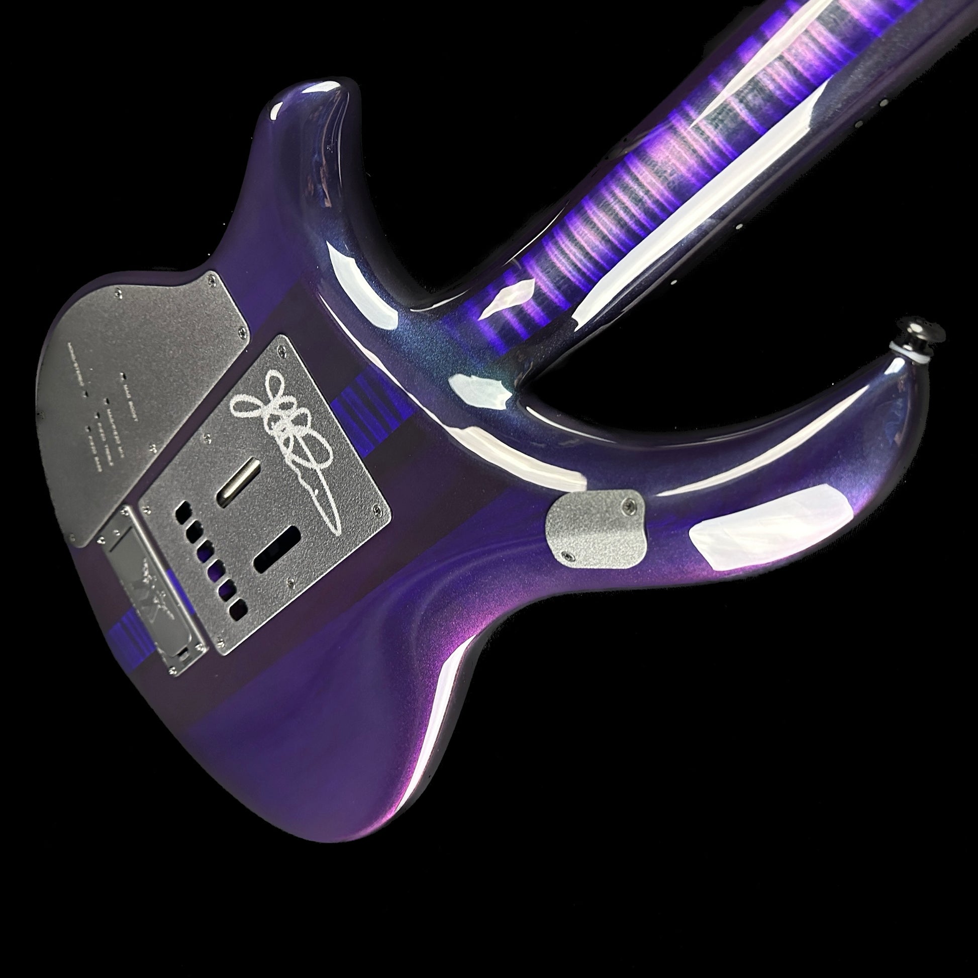 Back angle of Ernie Ball MusicMan Majesty 6 Limited Crystal Amethyst.