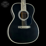 Front angle of Martin Custom Shop 45 Style OM Tree of Life Black.
