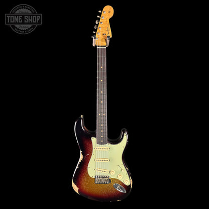 Electric guitar with a sunburst finish on a black background, featuring the Tone Shop logo.