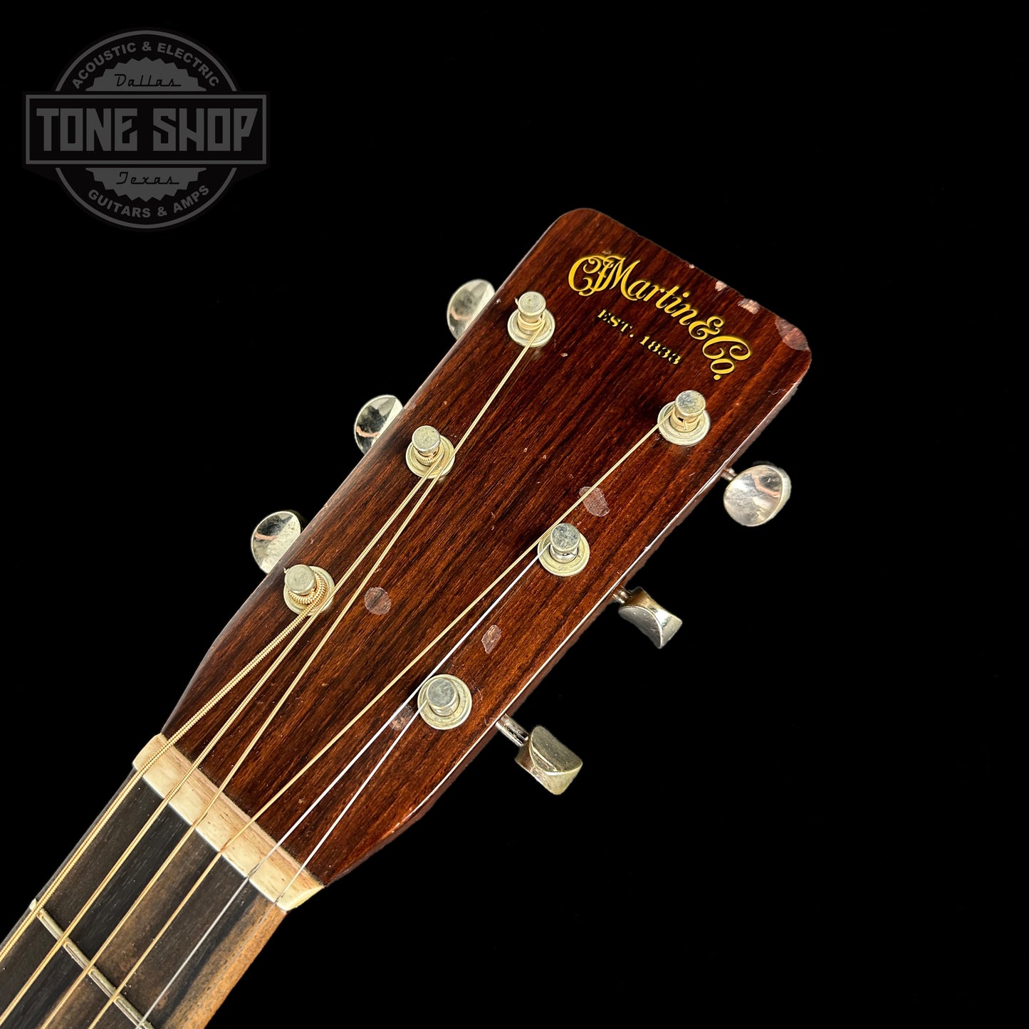Front of headstock of Martin D-28 Rich Robinson Custom Signature Edition.