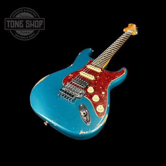 Front angle of Fender Custom Shop 69 Stratocaster Relic HSS Ocean Turquoise Reverse Headstock.