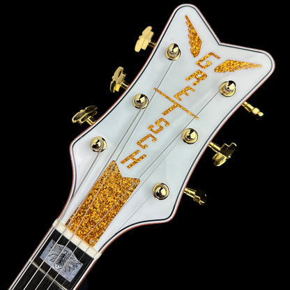 Front of headstock of Gretsch Custom Shop G6136-55 Fused Glass White Falcon.