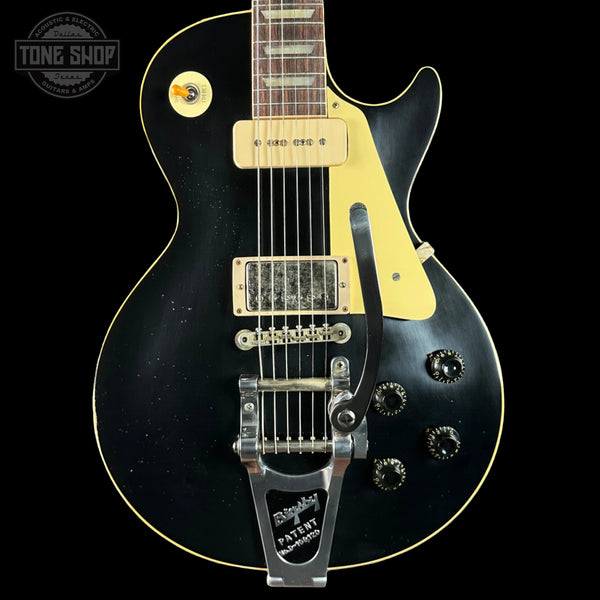 Front of Custom Shop Dealer Select 1956 Les Paul Standard Bigsby Ebony Top Light Aged NH.