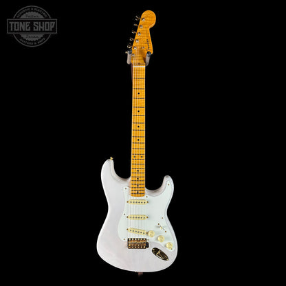 White electric guitar with a blonde fretboard on a black background, featuring 'Tone Shop' logo.