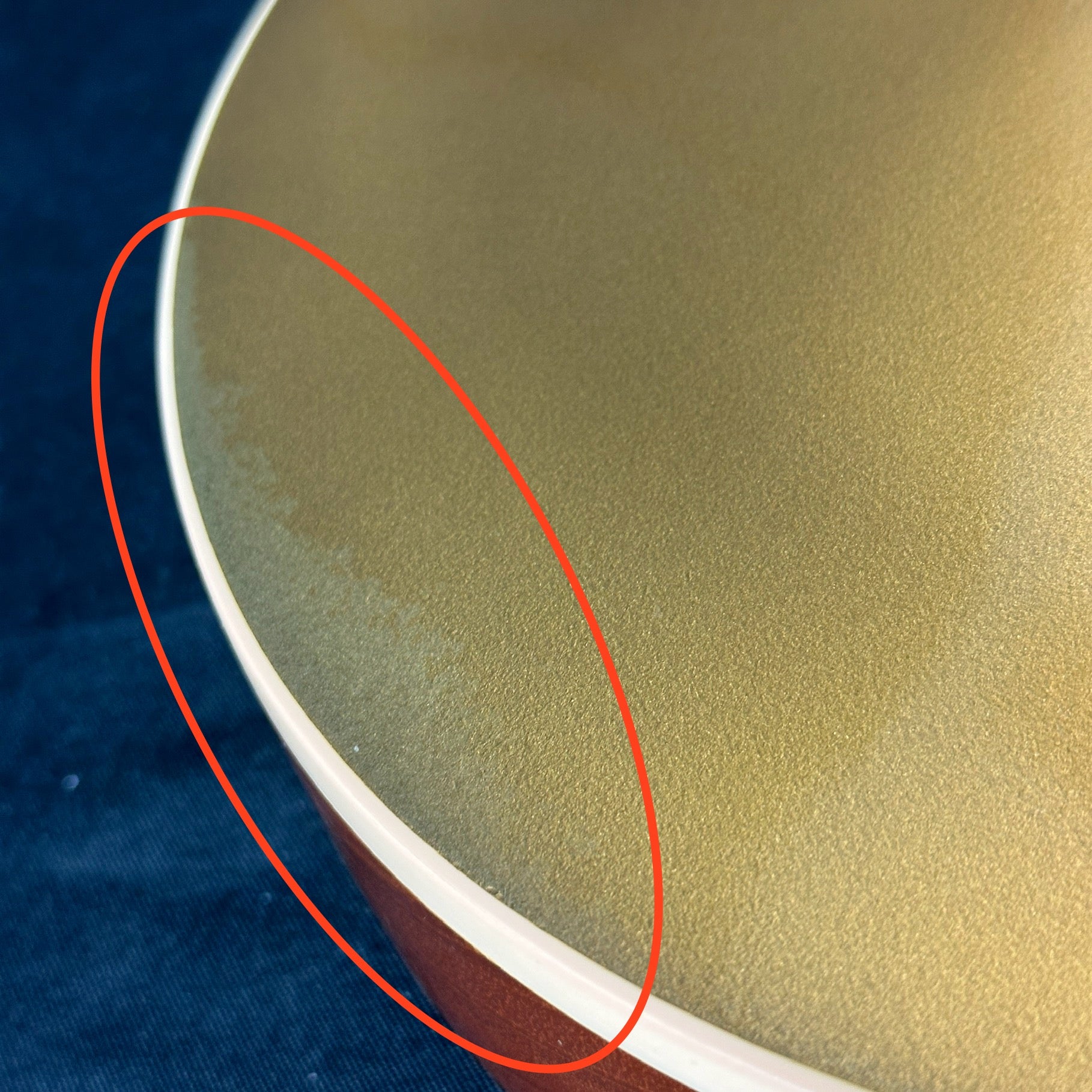 Discoloration in finish of Used Gibson Traditional Pro II Les Paul Gold.