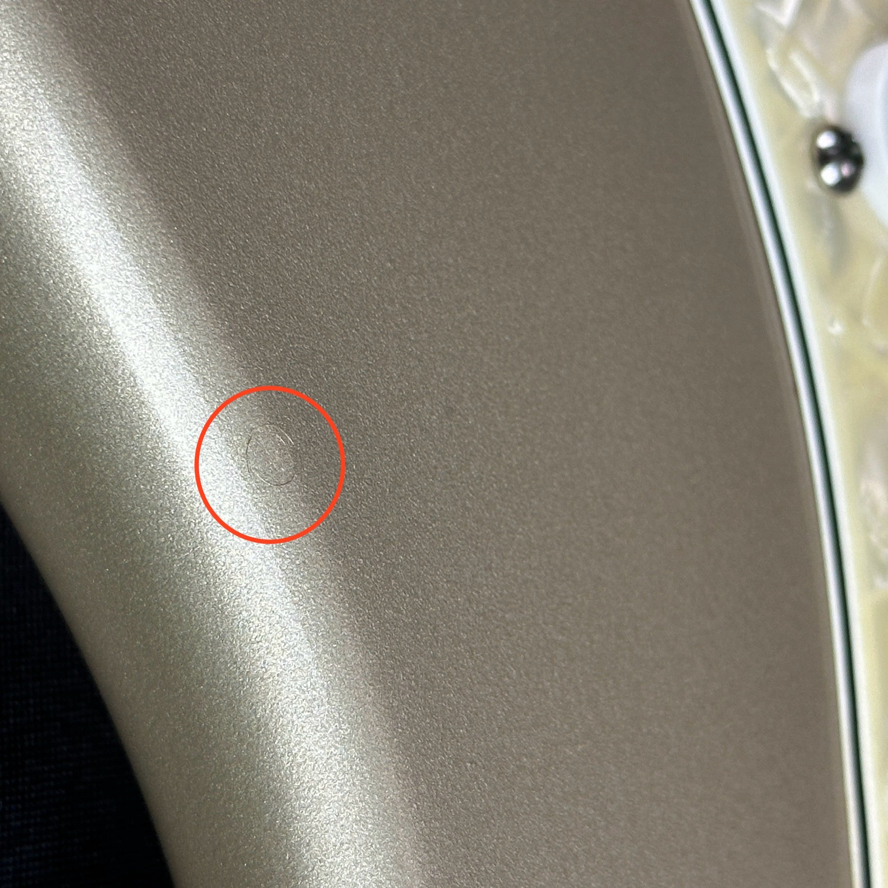 Small ding on side of Used 1997 Fender Lone Star Strat HSS Shoreline Gold.
