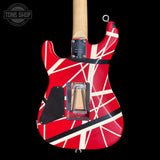 Red and white guitar with black accents on a black background, featuring the EVH logo.