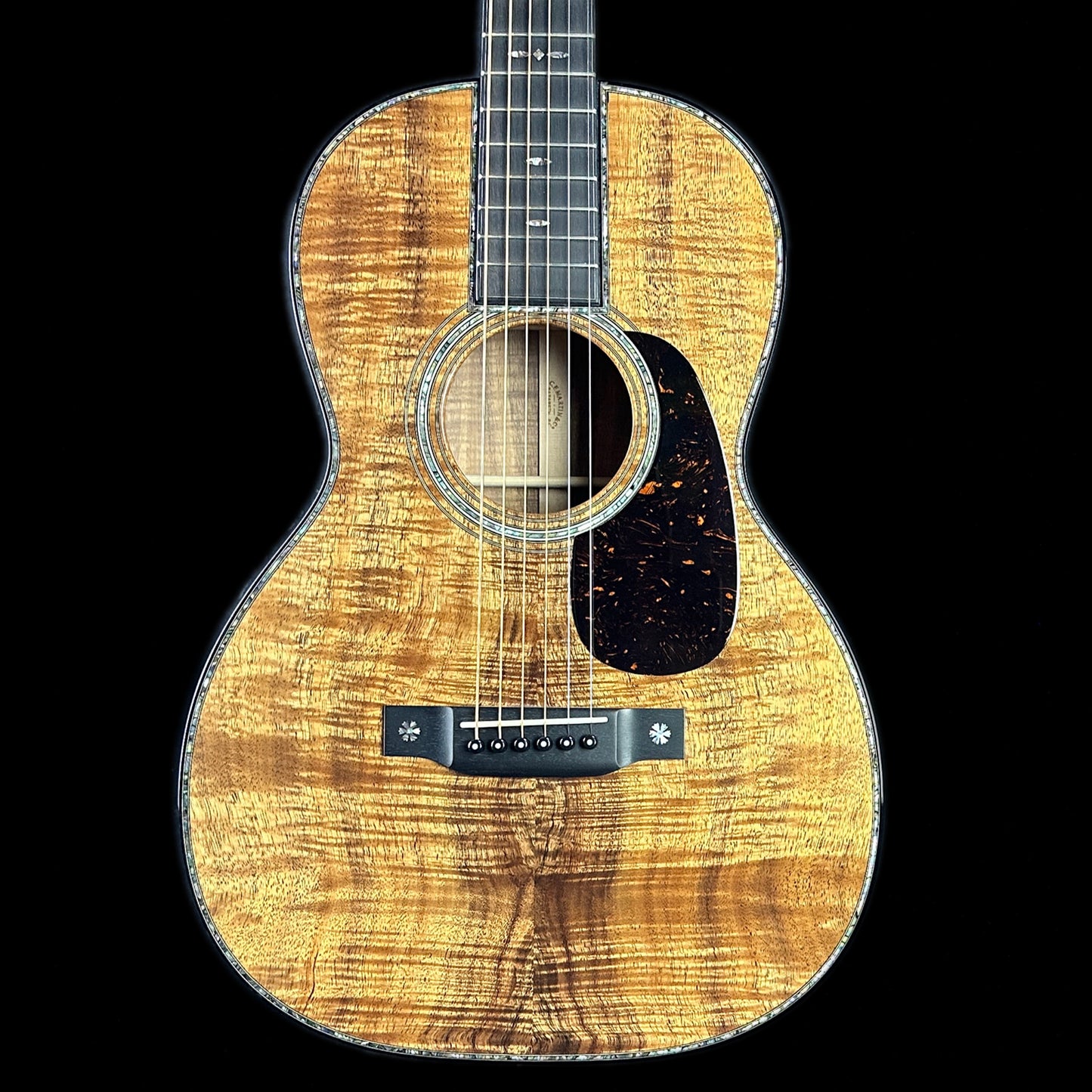 Front of body of Martin Custom Shop 42 Style 00-12F All Highly Flamed Koa w/Case.