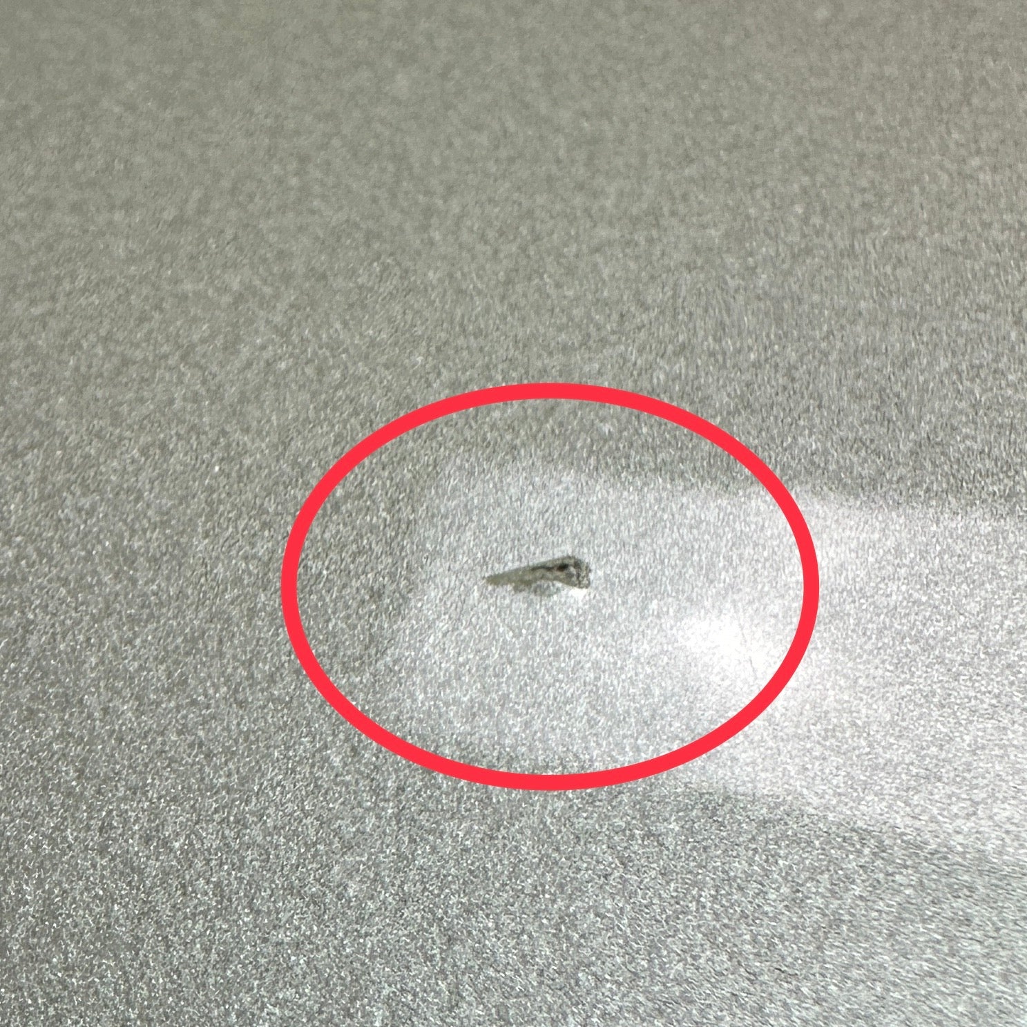 Small chip on front of body.