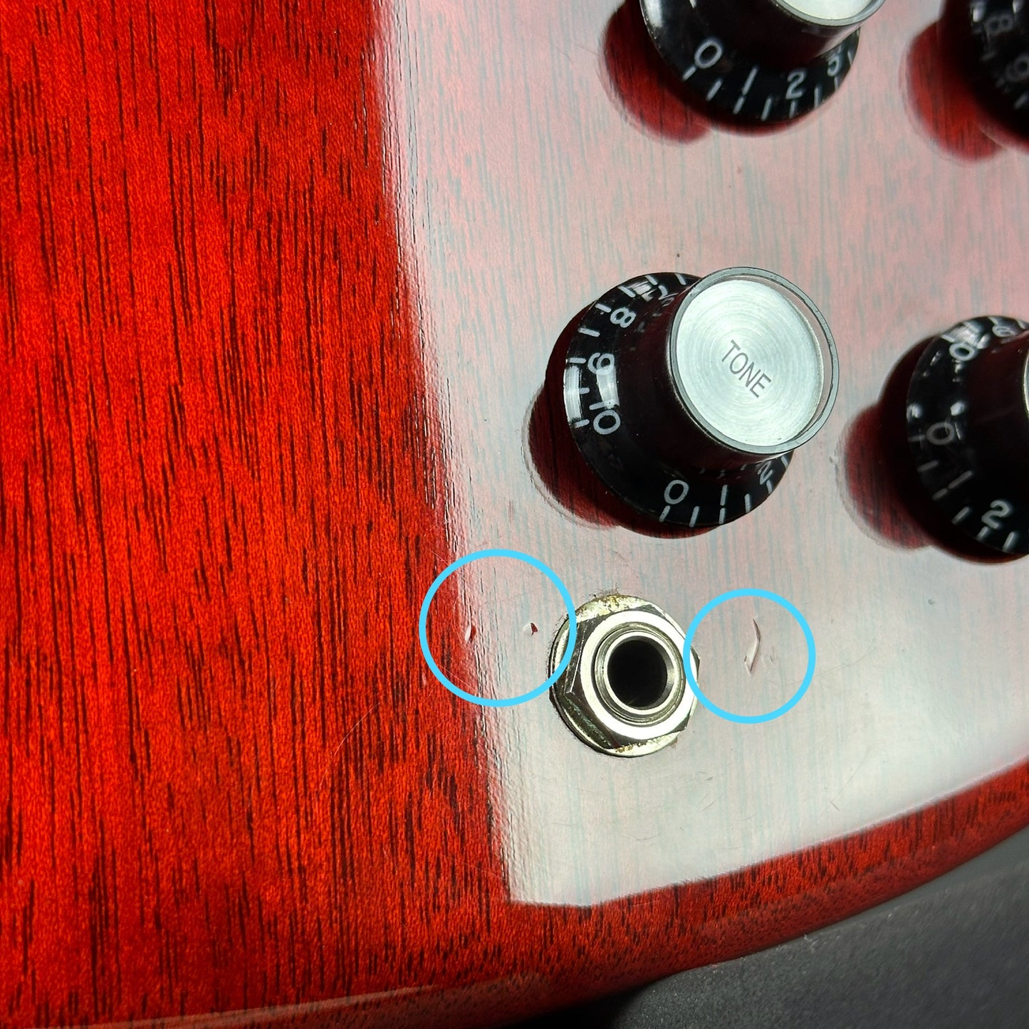 Small dings near output jack of Used 2016 Gibson SG Standard Cherry.