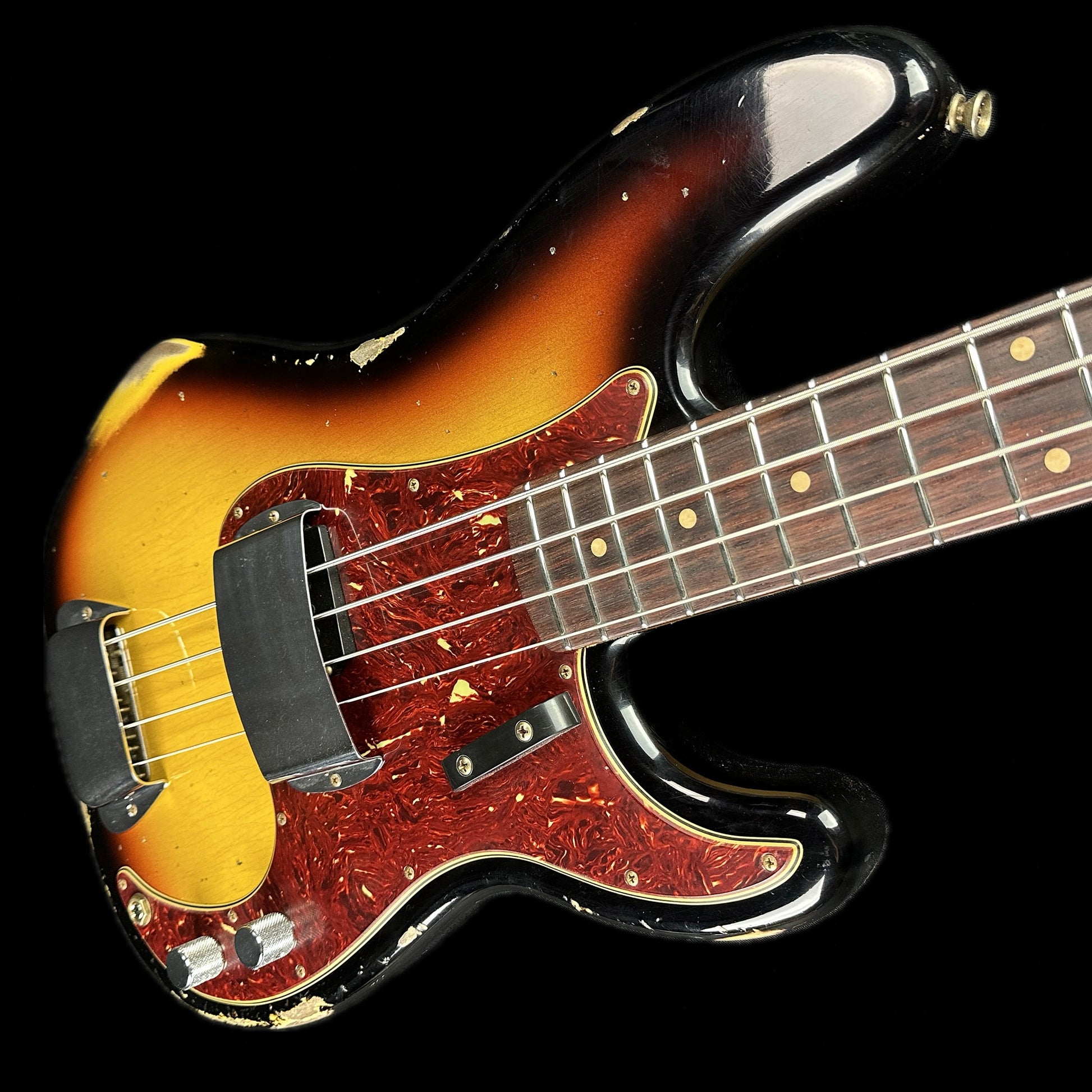 Front angle of Fender Custom Shop Limited Edition '63 Precision Bass Heavy Relic Faded Aged 3 Color Sunburst.