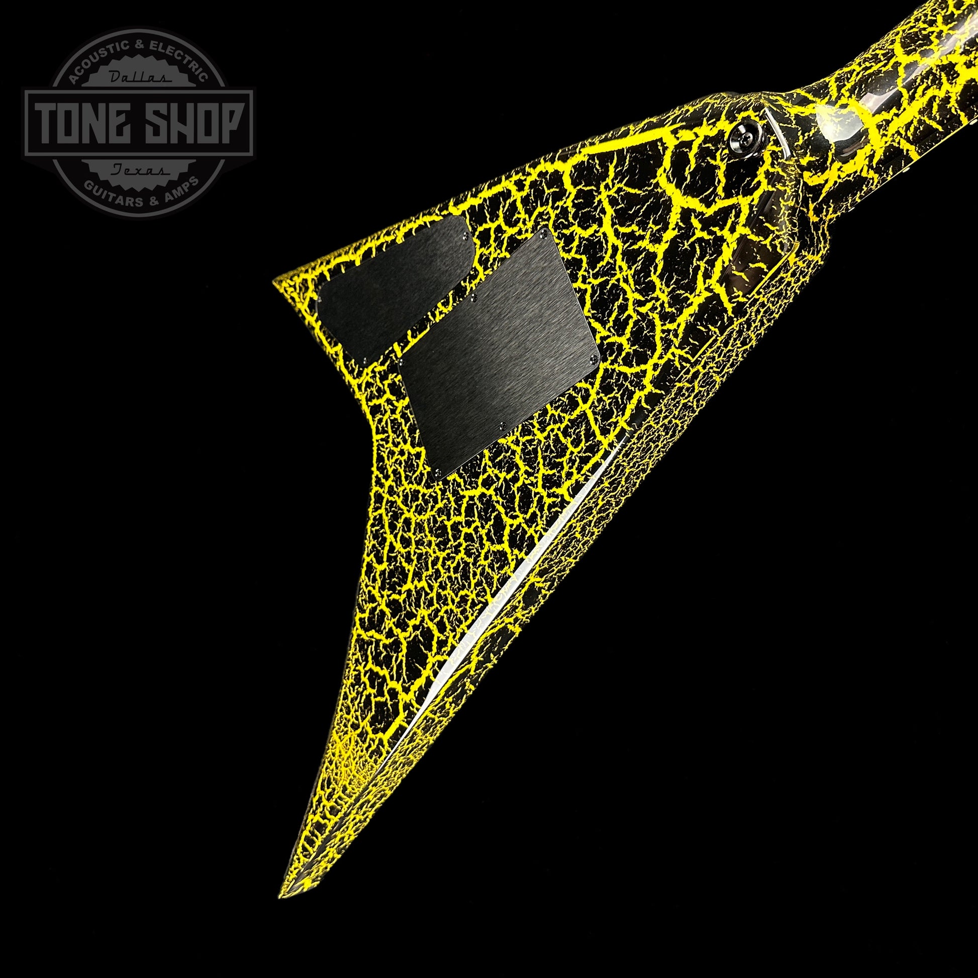 Back angle of Jackson Custom Shop Limited Edition Randy Rhoads Nos Black With Yellow Crackle.